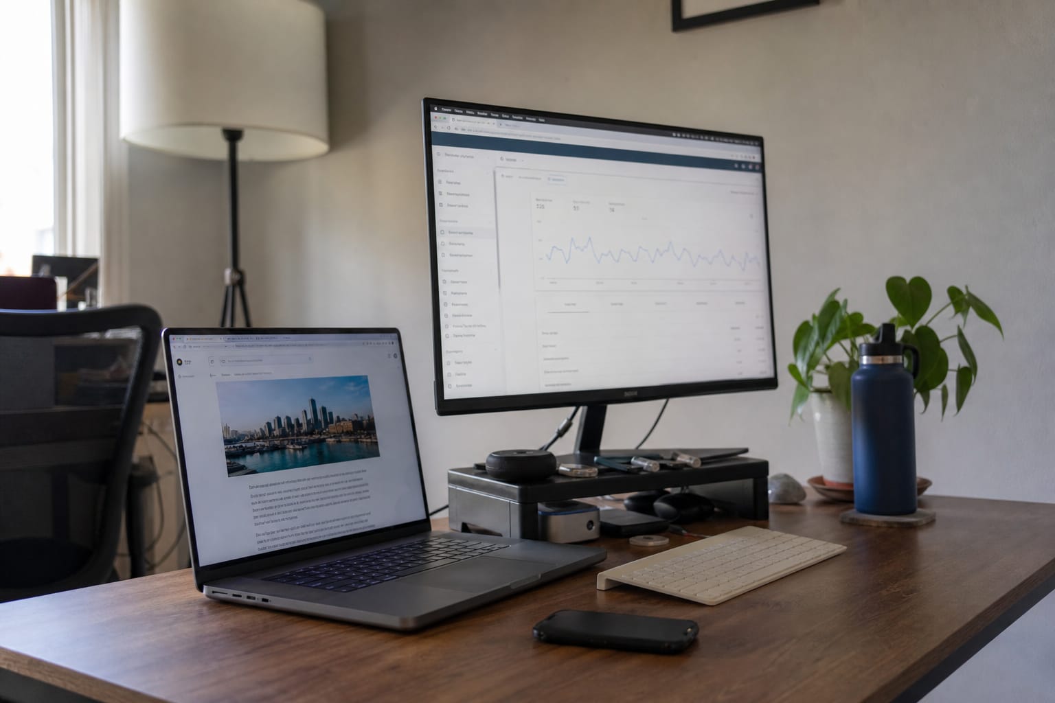 Laptop showing a published blog post next to Google Search Console and a day-count sticky note